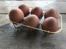 Raw chicken orange eggs