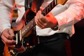 musician in a suit guitar player