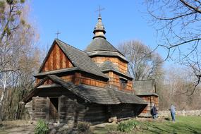 wooden house with people