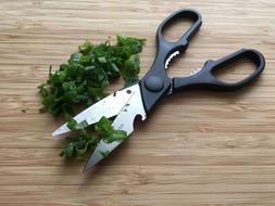 scissors lying on sliced onions