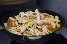 Stewed chicken with vegetables in sauce