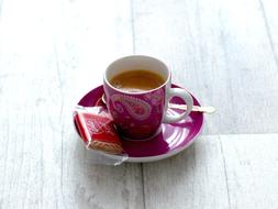 hot sweet coffee with cookies on a saucer