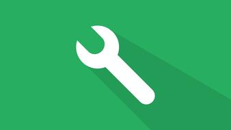 White icon of wrench, at green background with the shadow, clipart