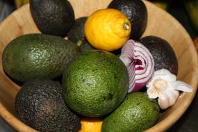 Tasty healthy fruits and vegetables on a plate