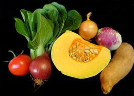 fresh delicious vegetables on a black background