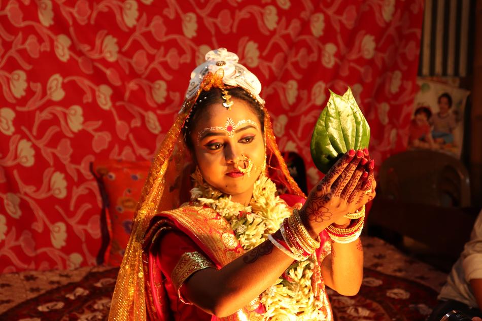 Wedding dressed woman in Village