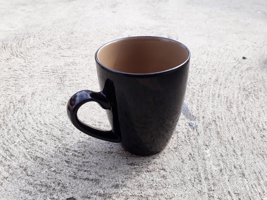 brown mug on a white table