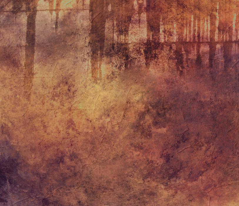 silhouettes of trees on an aged background