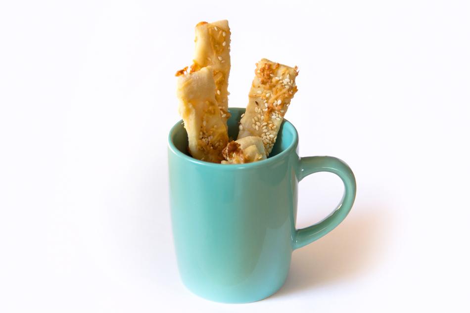 pickle sticks snack in a blue cup