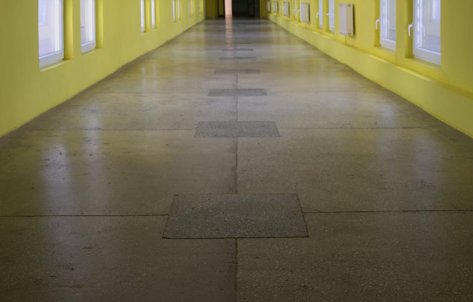 yellow corridor with a window