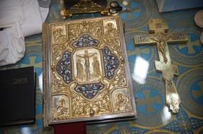 bible with a cross in the church