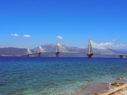 ships in the blue ocean with mountains