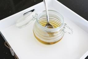 sugar honey in a glass jar
