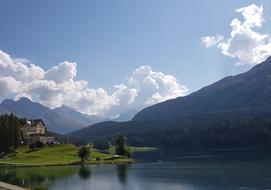 mountain with clouds and blue sky