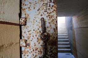 rusty fence on a metal door