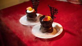 Hot chocolate dessert with fruit in a plate