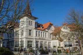 beautiful cafe building with a terrace