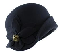 women's hat with a bow and a gold button