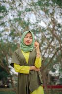 girl in green hijab in indonesia