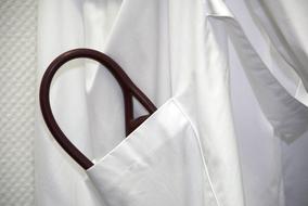device in a white doctor's coat close-up