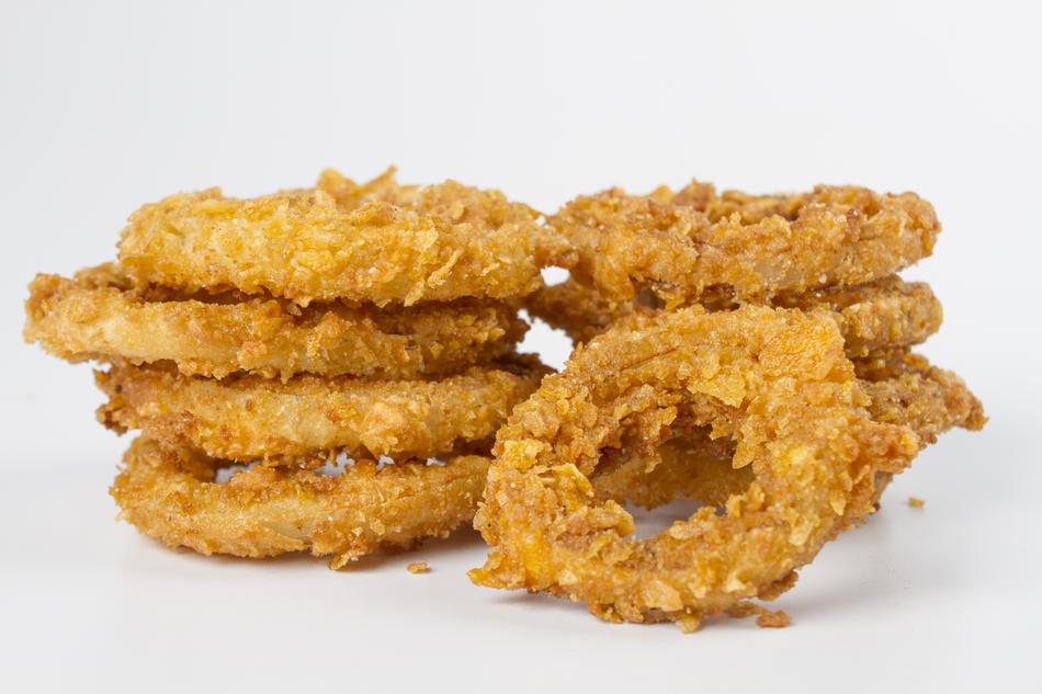 fried onion rings on a white background