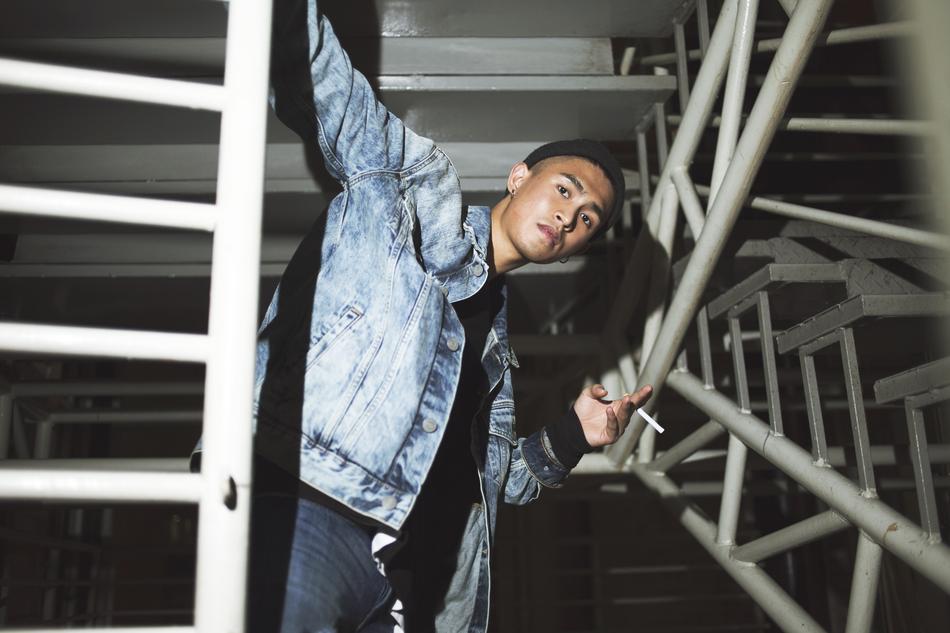 man with a cigarette on the stairs