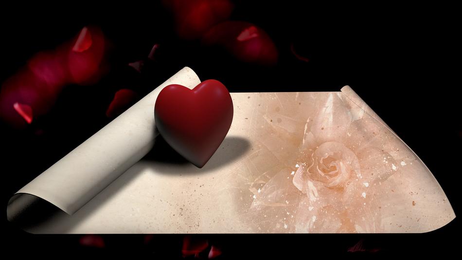 red serzde with paper and a rose.
