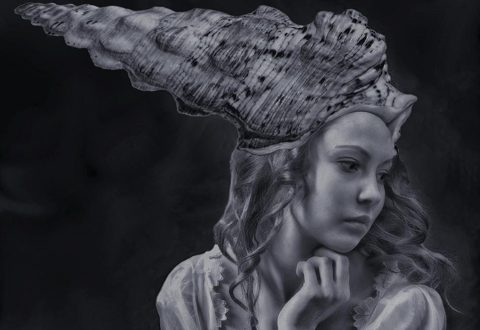a beautiful girl with an unusual hat