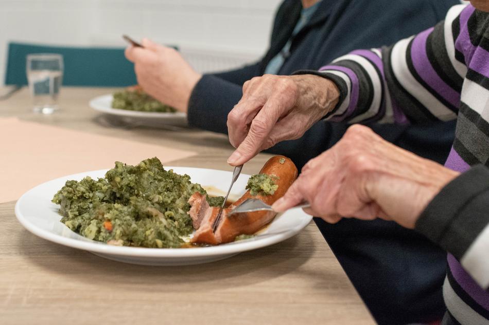 old people eat in the dining room