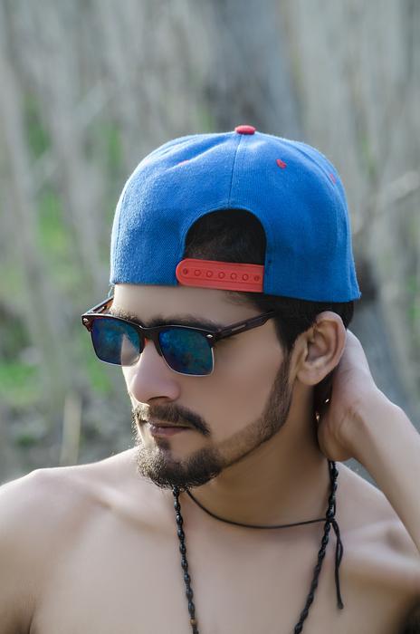 man in a blue hat