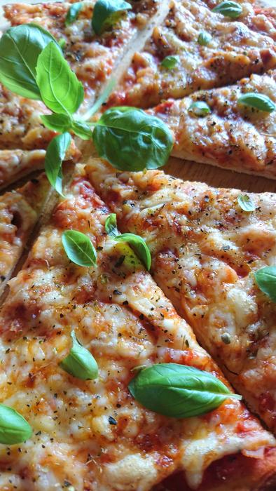 Cheese pizza with baselisk