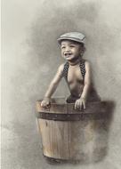 boy male in wooden keg