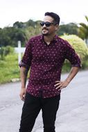attractive man in burgundy shirt