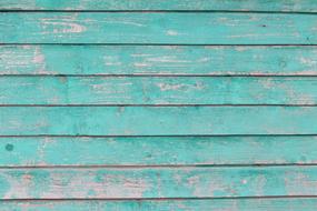 old green paint on a wooden wall