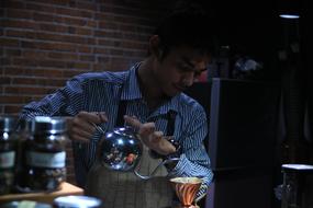 man at work as a barista