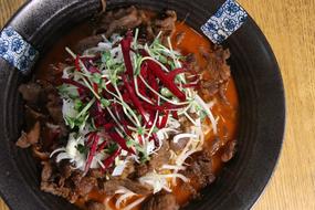 Chinese dish with meat in sauce with vegetables