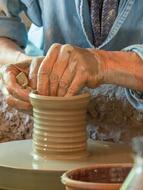 Hands making Clay Potter