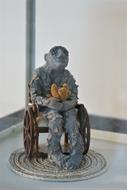Art Figure disabled person in a wheelchair