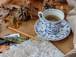 card with a pencil and hot coffee
