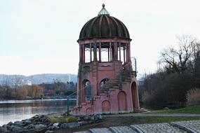 red tower with a dome