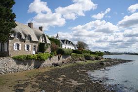 stone building by the beach