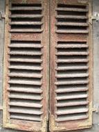 wooden windows view of the building