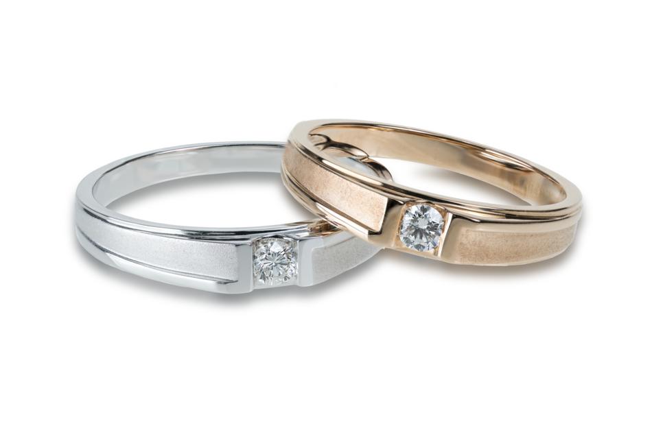 silver and gold ring with stones