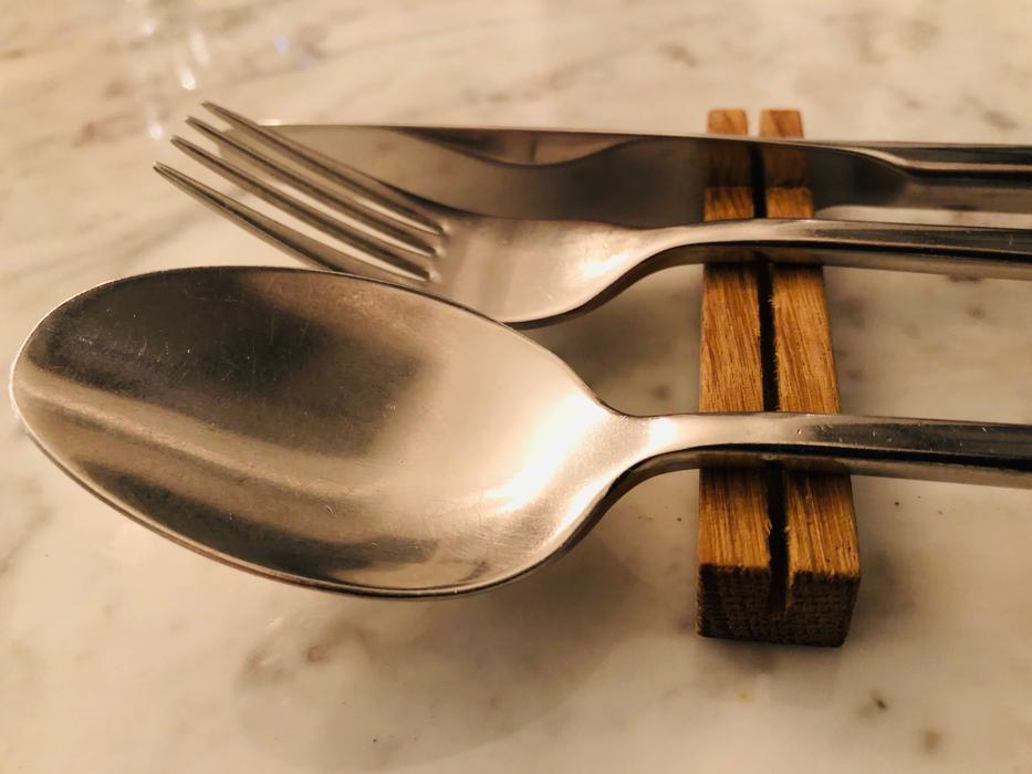 iron spoon with fork and knife
