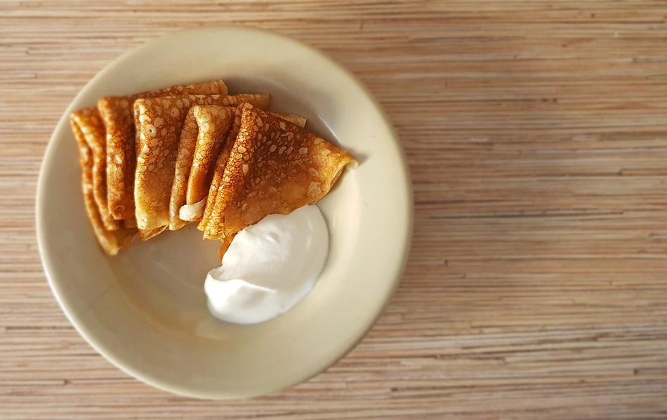 fried pancakes with sour cream