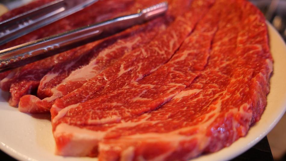Slices of red meat in a plate