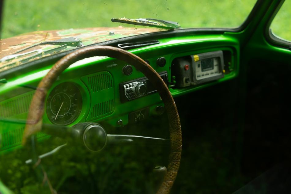 Interior of the old VW Beetle car with details, in blue colors