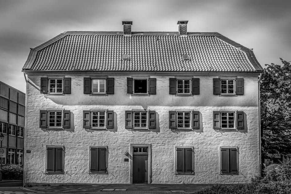 a brick old house with windows