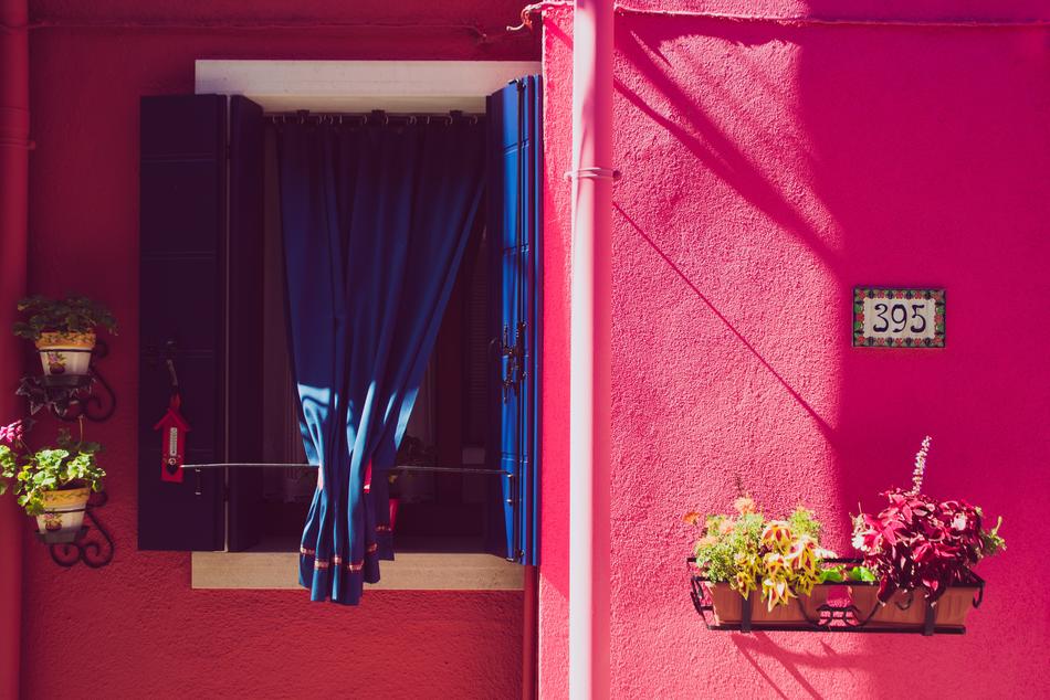 blue curtains with a pink background