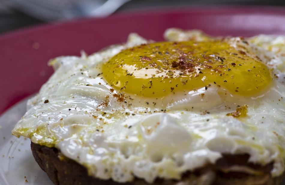 fried egg and spices on bread